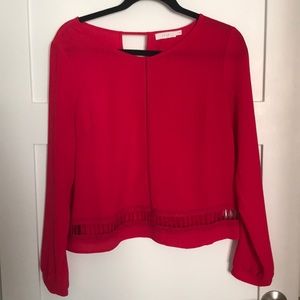 Long sleeve red top by Lush with cutout detail